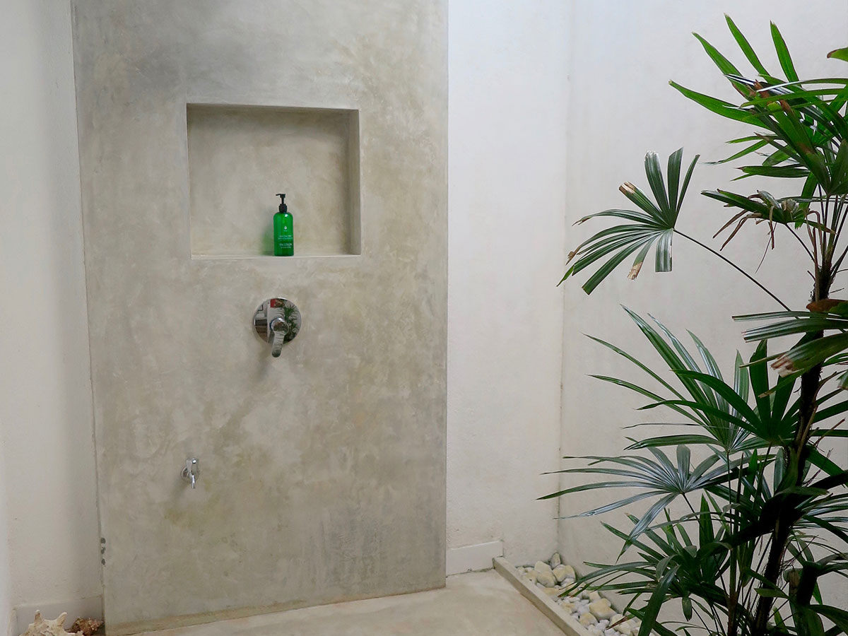 Cement wall open shower area